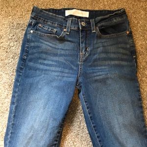 mid rise, boot cut blue jeans